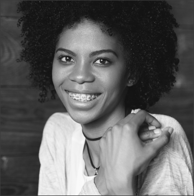headshot-of-black-romantic-looking-girl-with-brace-5SUGQHM@2x